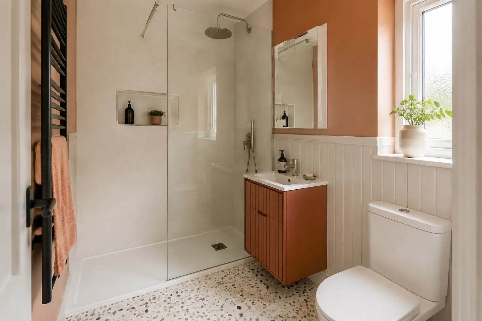 Compact peach and terrazzo contemporary bathroom