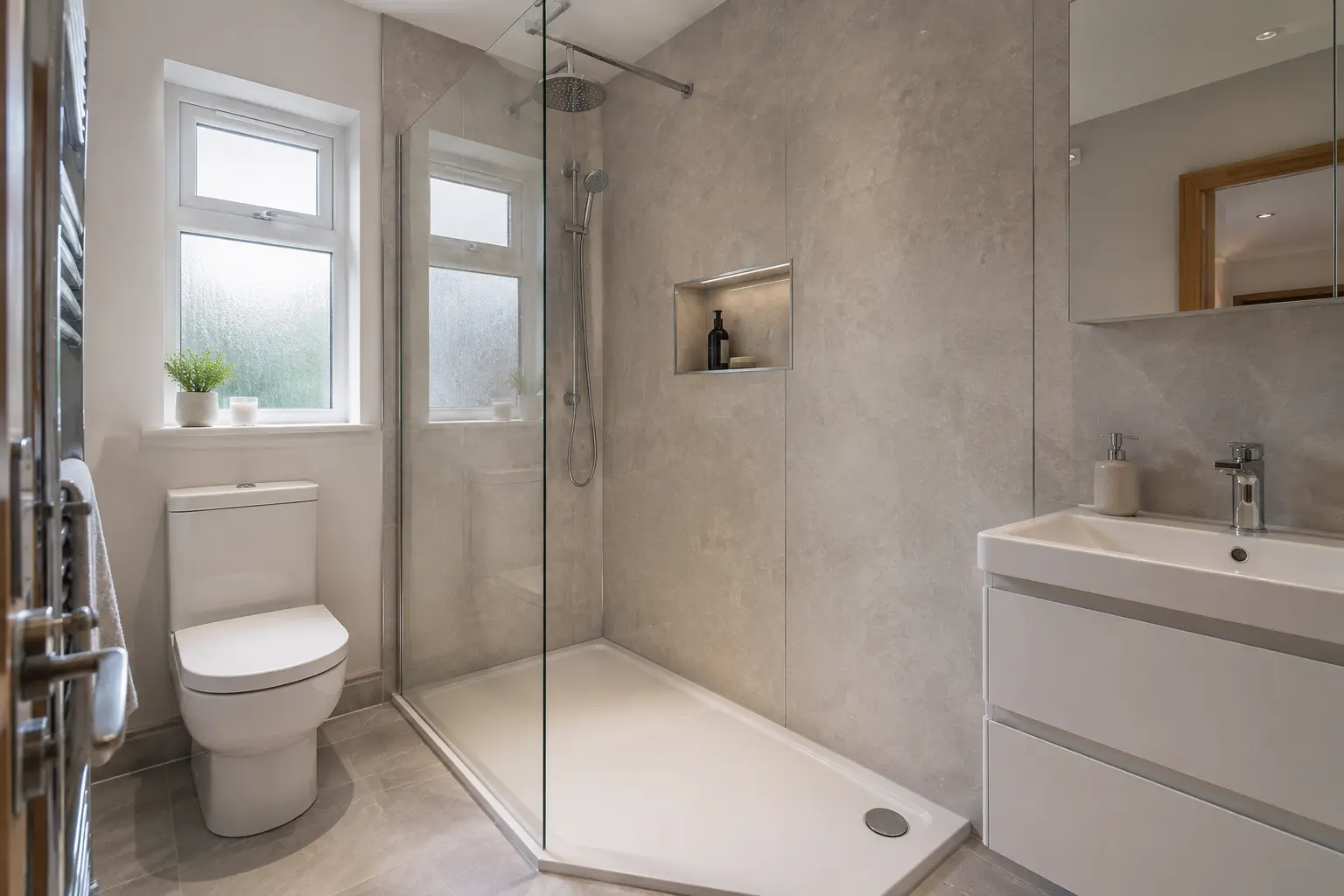 Shower room with pale wall panels and white basin drawers
