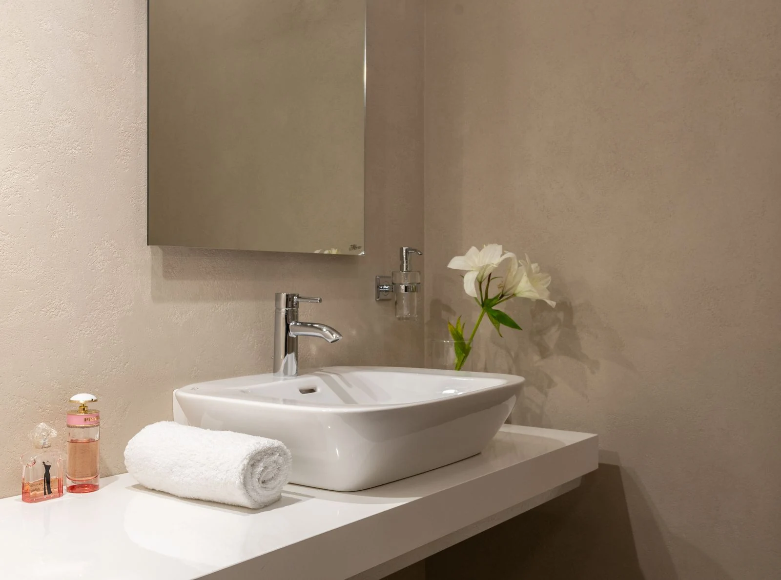 Bathroom basin and folded towel